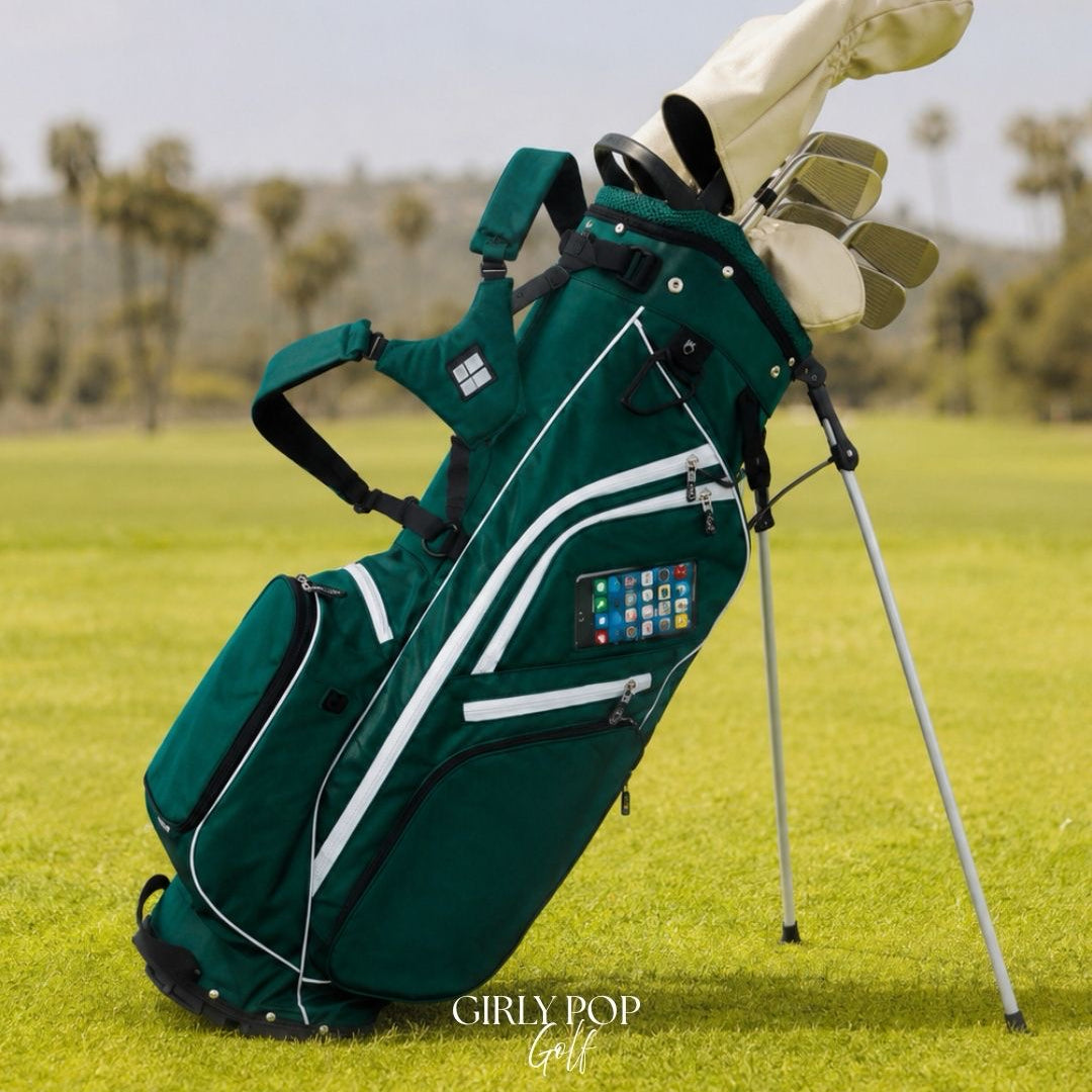 Green golf bag with clubs on a grassy field